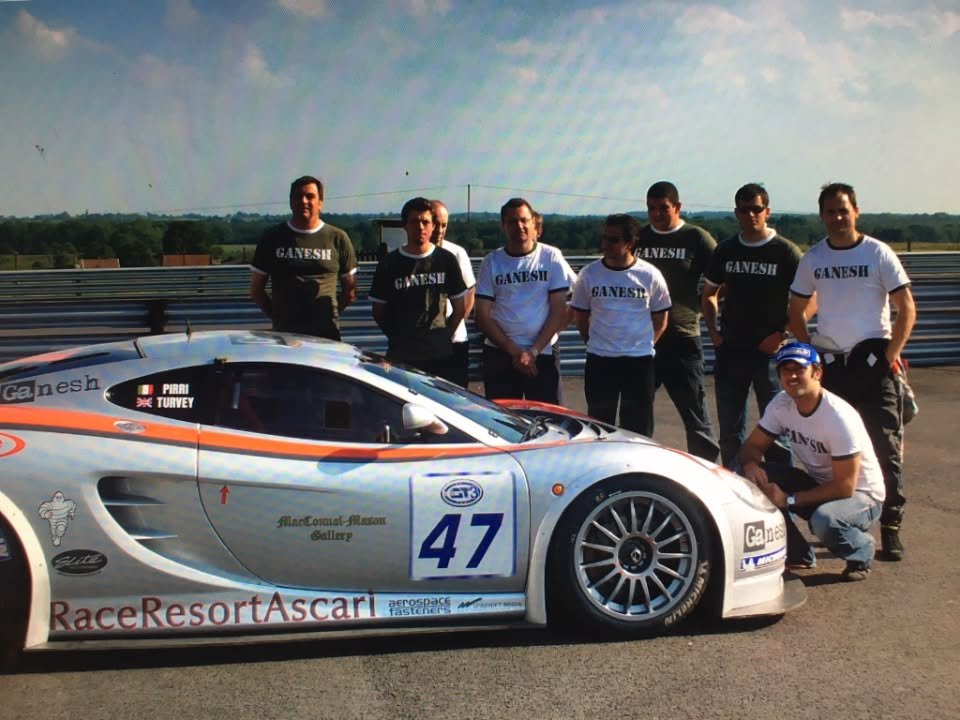 Team, with the Ascari car