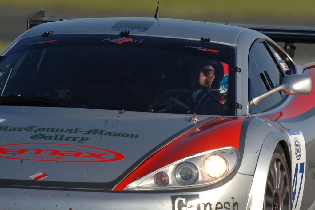 Luca Pirri inside of the Ascari KZ1-R GT3 car