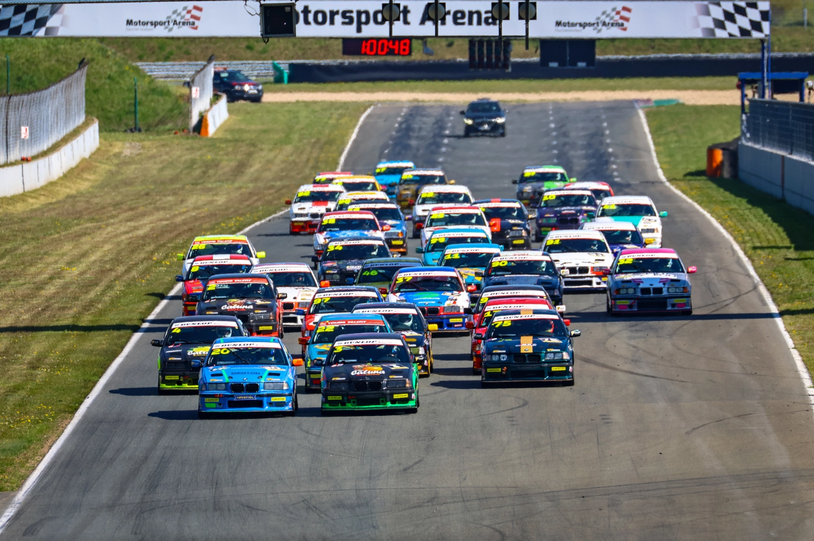 Race Start at Motorsport Arena Oschersleben with all the BMW 318ti Cup going into T1